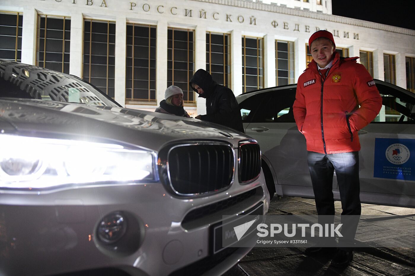 Prime Minister Dmitry Medvedev presents cars to 2018 Winter Olympics medalists at ceremony
