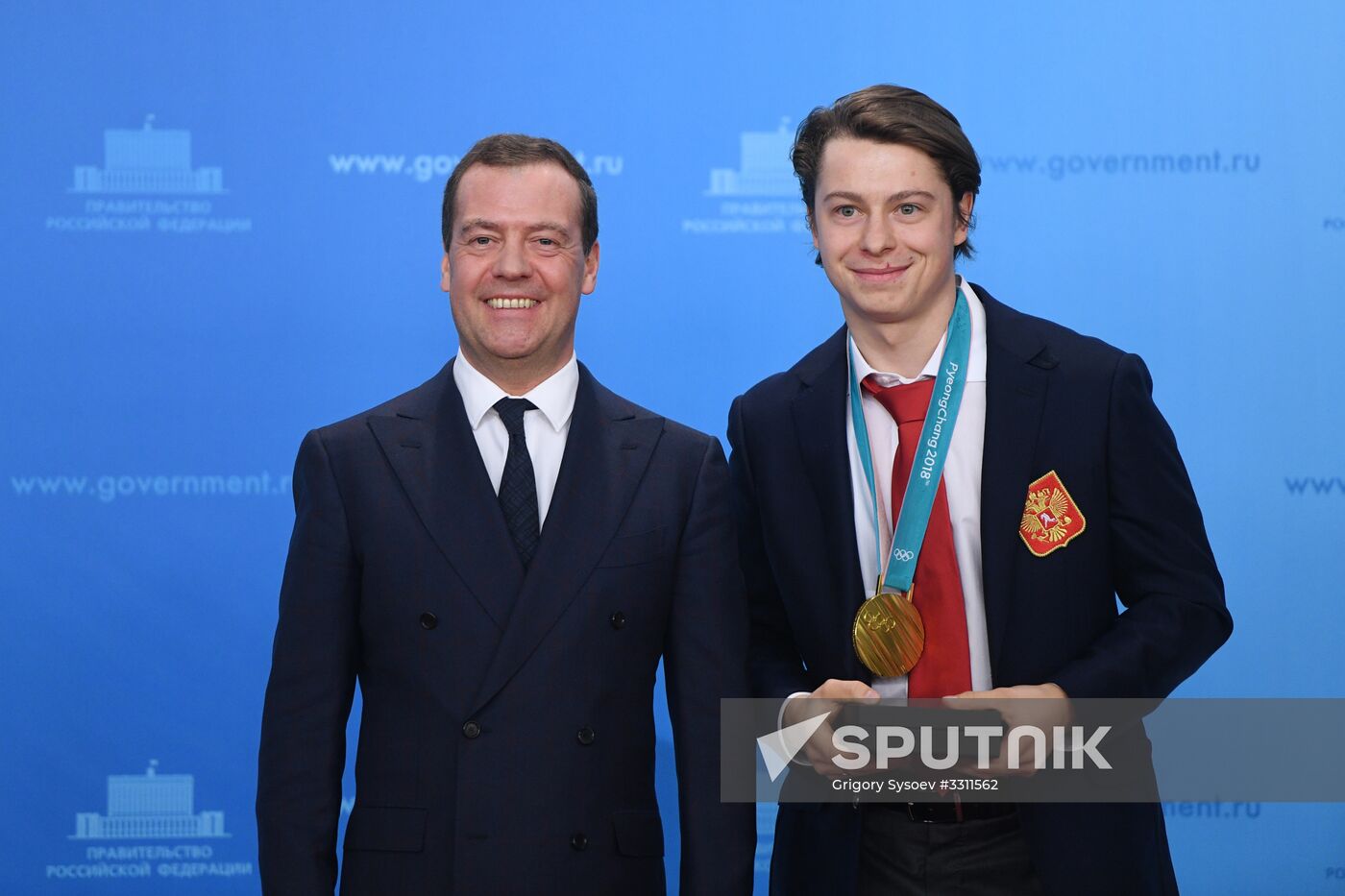 Prime Minister Dmitry Medvedev presents cars to 2018 Winter Olympics medalists at ceremony