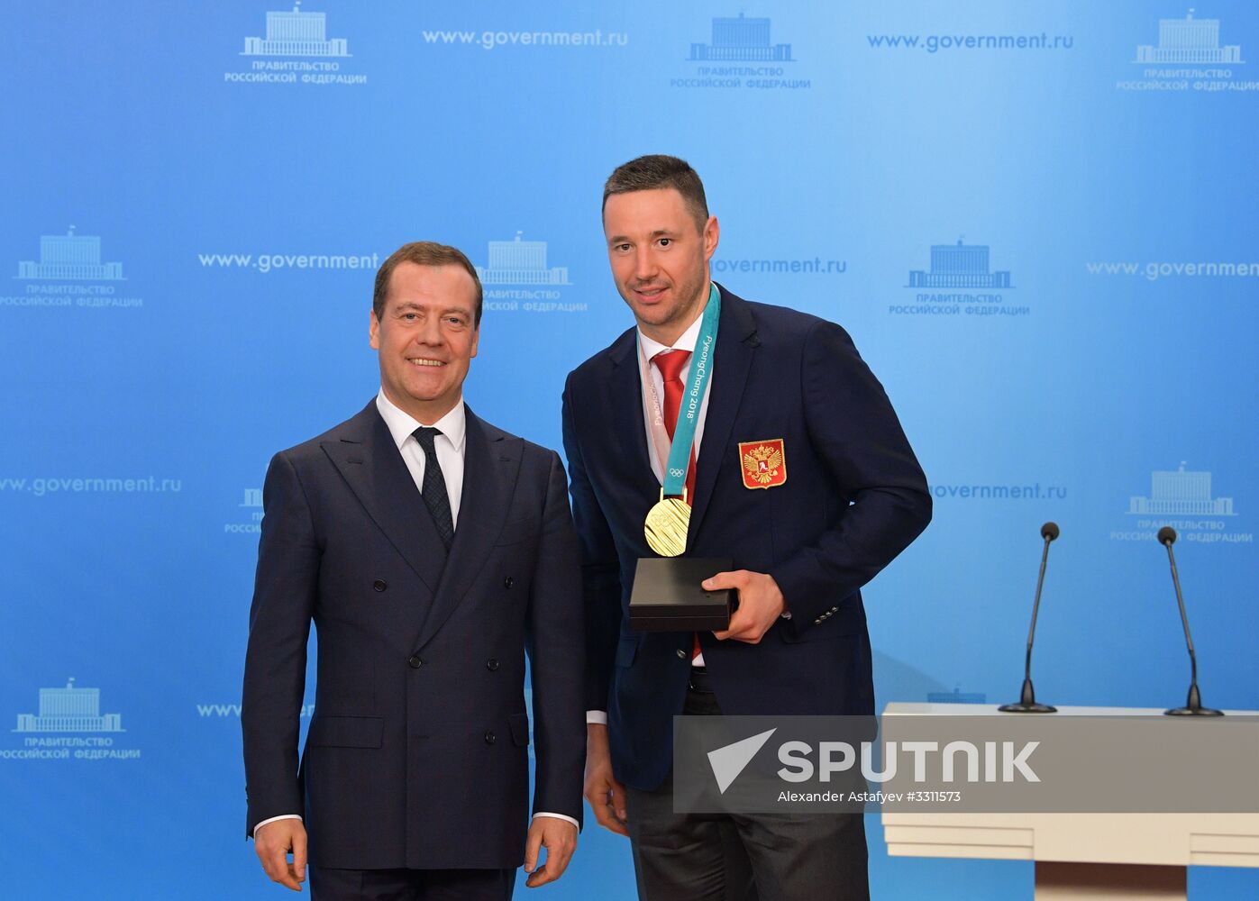 Prime Minister Dmitry Medvedev presents cars to 2018 Winter Olympics medalists at ceremony