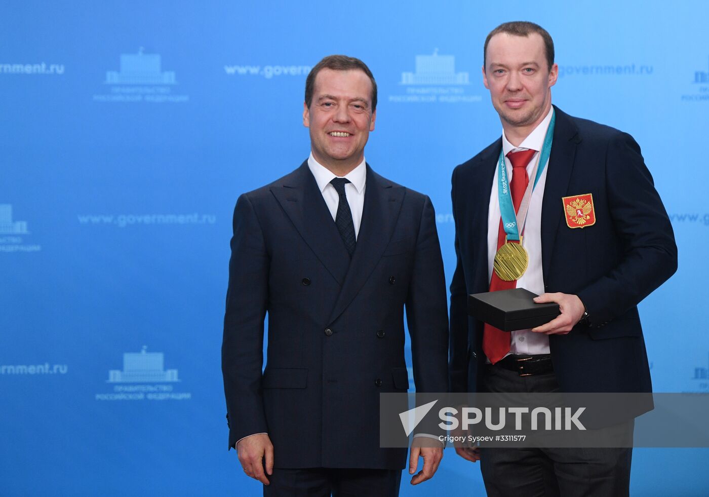 Prime Minister Dmitry Medvedev presents cars to 2018 Winter Olympics medalists at ceremony