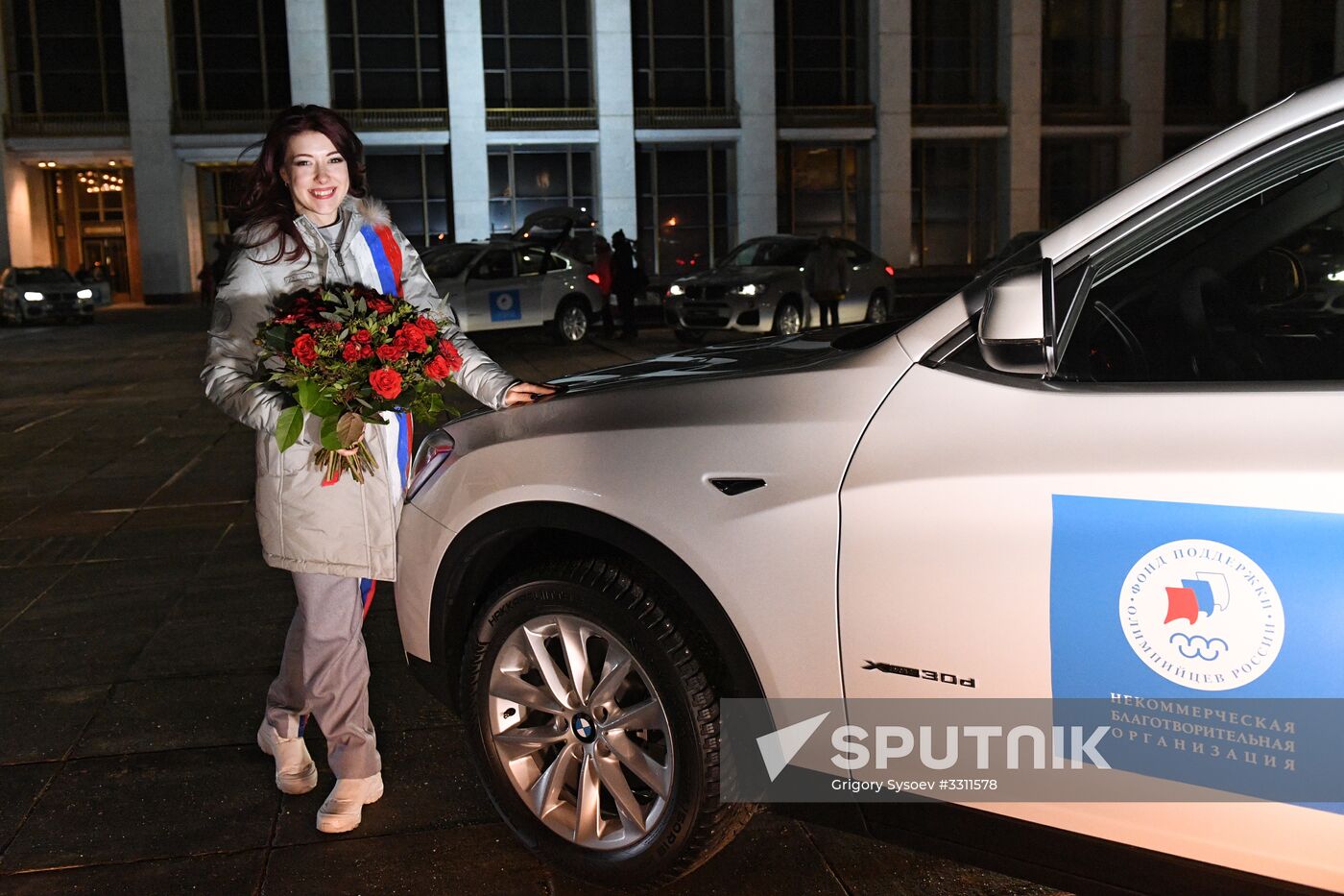 Prime Minister Dmitry Medvedev presents cars to 2018 Winter Olympics medalists at ceremony