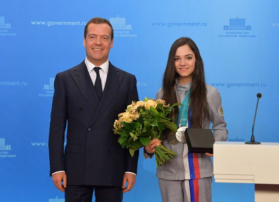 Prime Minister Dmitry Medvedev presents cars to 2018 Winter Olympics medalists at ceremony