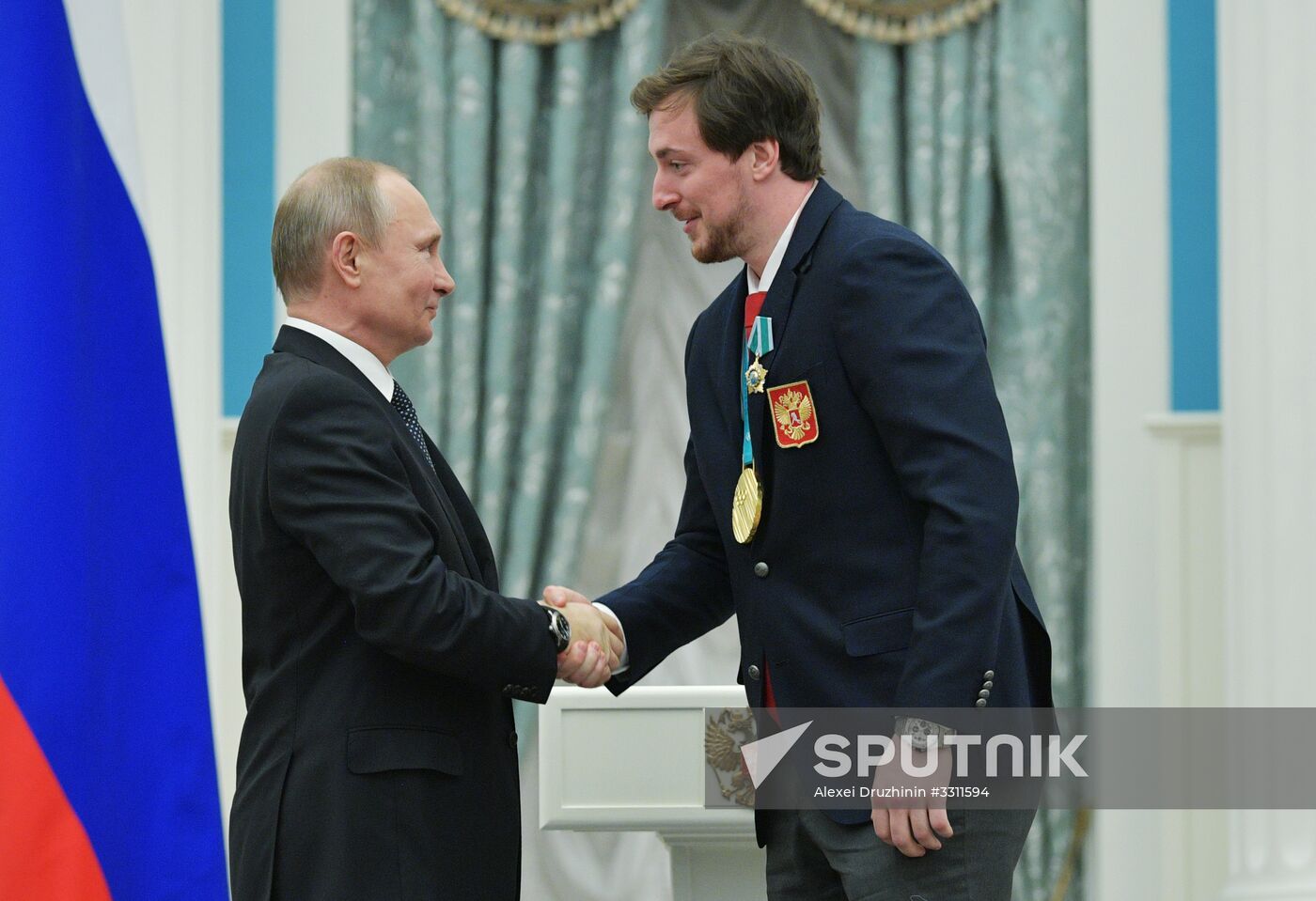 President Vladimir Putin presents state decorations to 2018 Winter Olympics medalists
