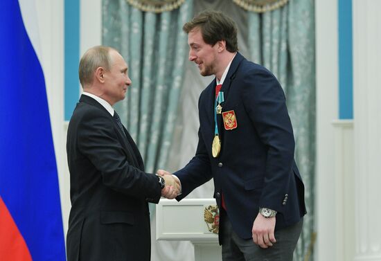 President Vladimir Putin presents state decorations to 2018 Winter Olympics medalists