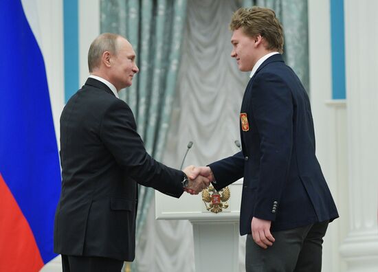 President Vladimir Putin presents state decorations to 2018 Winter Olympics medalists