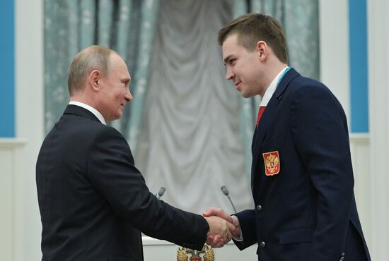 President Vladimir Putin presents state decorations to 2018 Winter Olympics medalists