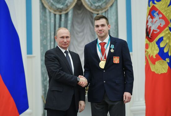 President Vladimir Putin presents state decorations to 2018 Winter Olympics medalists