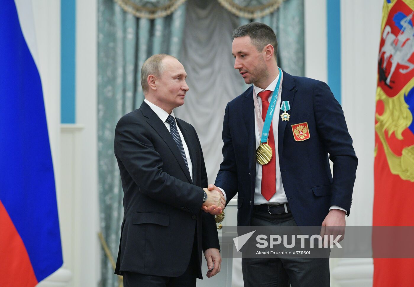 President Vladimir Putin presents state decorations to 2018 Winter Olympics medalists
