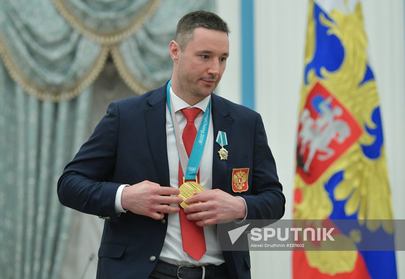 President Vladimir Putin presents state decorations to 2018 Winter Olympics medalists