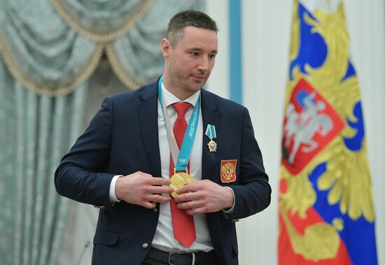 President Vladimir Putin presents state decorations to 2018 Winter Olympics medalists
