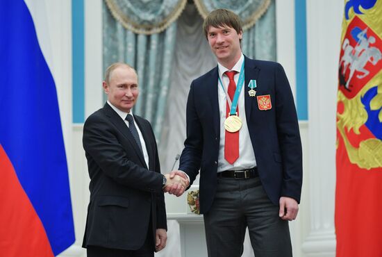 President Vladimir Putin presents state decorations to 2018 Winter Olympics medalists