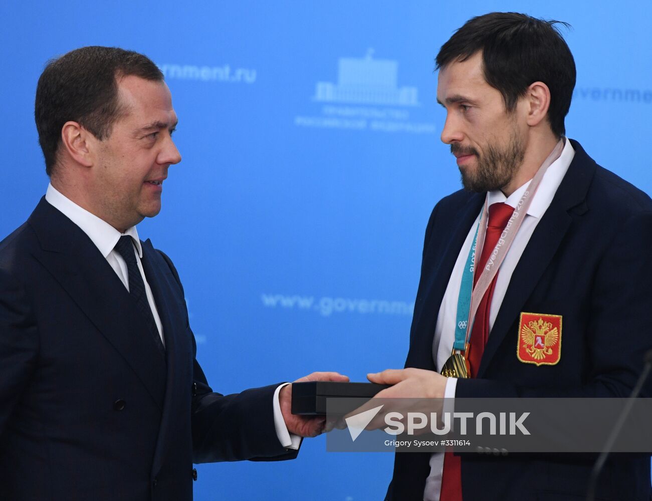 Prime Minister Dmitry Medvedev presents cars to 2018 Winter Olympics medalists at ceremony