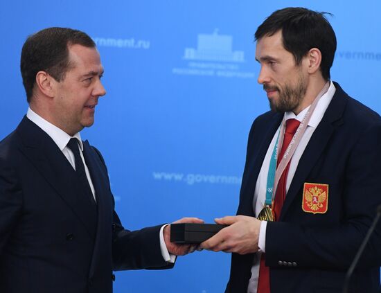 Prime Minister Dmitry Medvedev presents cars to 2018 Winter Olympics medalists at ceremony