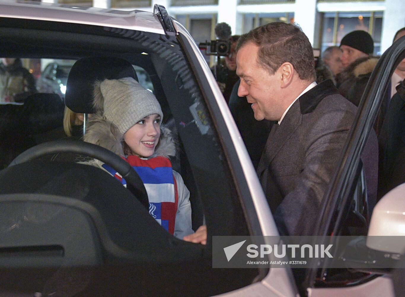 Prime Minister Dmitry Medvedev presents cars to 2018 Winter Olympics medalists at ceremony