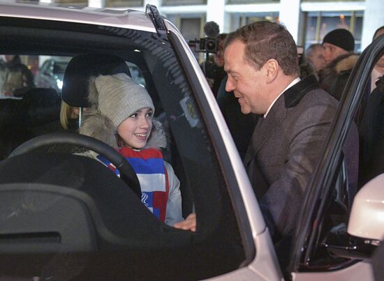 Prime Minister Dmitry Medvedev presents cars to 2018 Winter Olympics medalists at ceremony