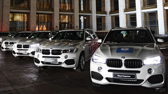 Prime Minister Dmitry Medvedev presents cars to 2018 Winter Olympics medalists at ceremony