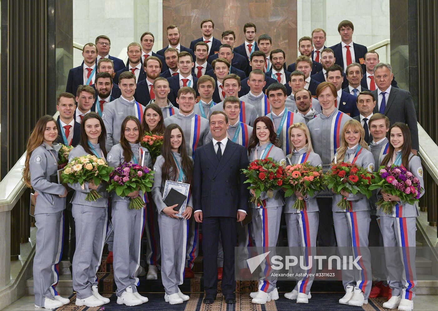 Prime Minister Dmitry Medvedev presents cars to 2018 Winter Olympics medalists at ceremony