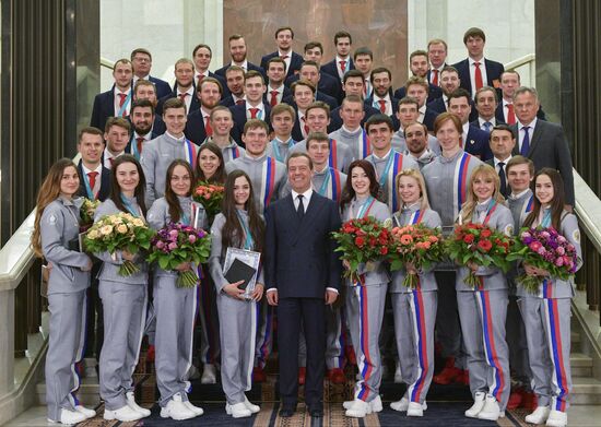 Prime Minister Dmitry Medvedev presents cars to 2018 Winter Olympics medalists at ceremony