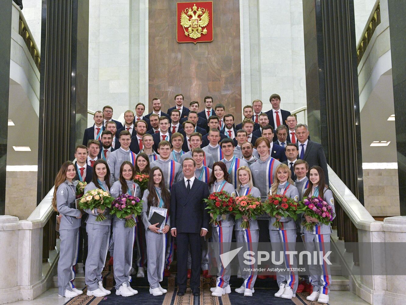 Prime Minister Dmitry Medvedev presents cars to 2018 Winter Olympics medalists at ceremony