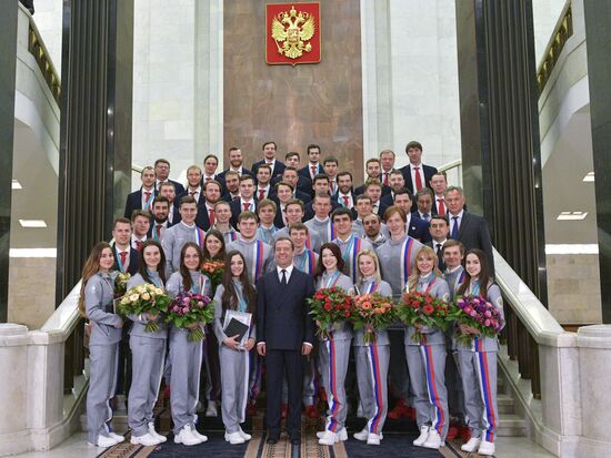 Prime Minister Dmitry Medvedev presents cars to 2018 Winter Olympics medalists at ceremony