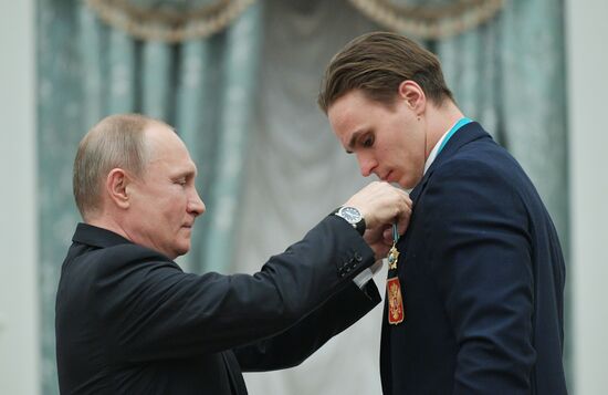 President Vladimir Putin presents state decorations to 2018 Winter Olympics medalists