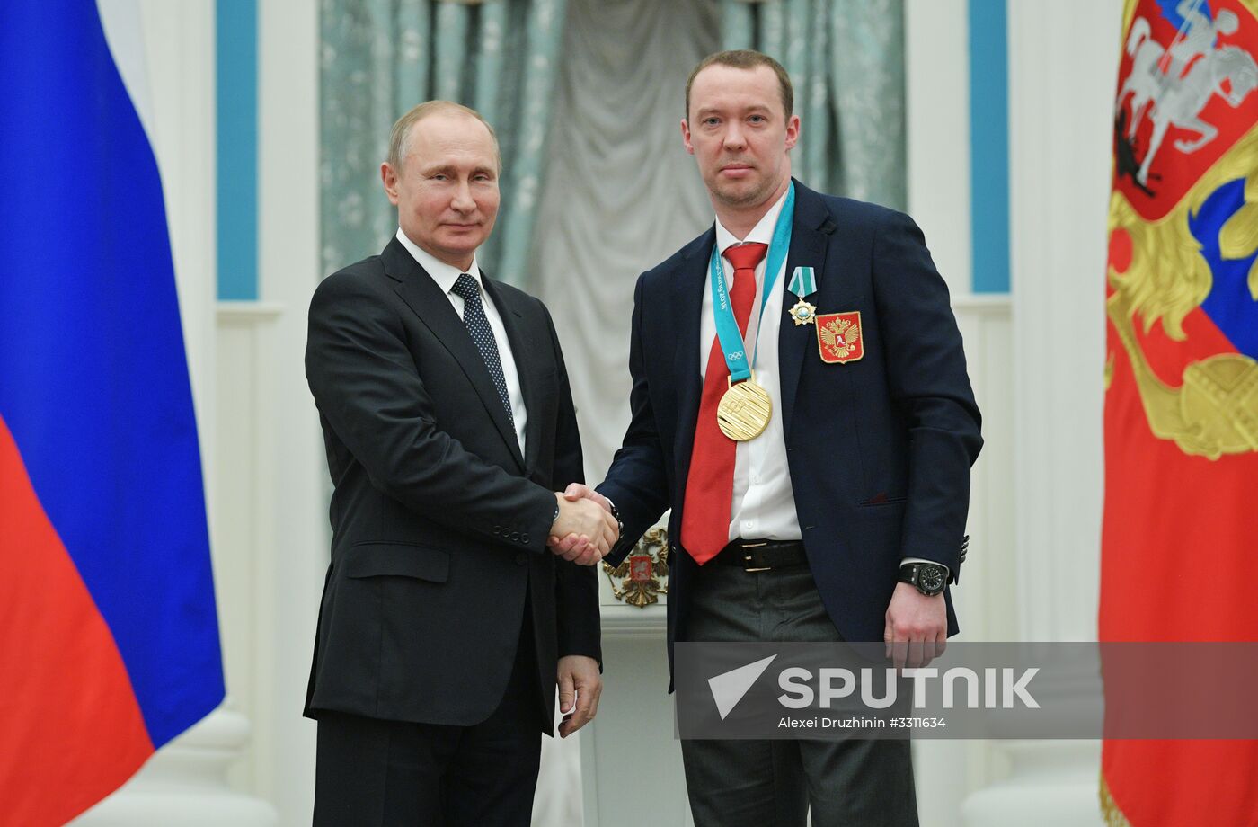 President Vladimir Putin presents state decorations to 2018 Winter Olympics medalists