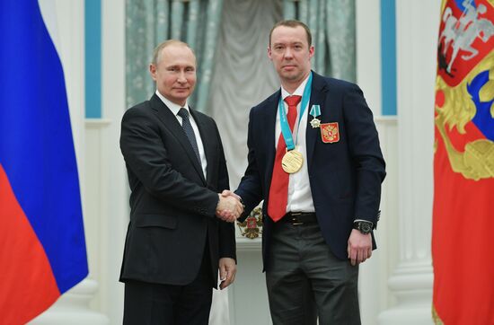 President Vladimir Putin presents state decorations to 2018 Winter Olympics medalists