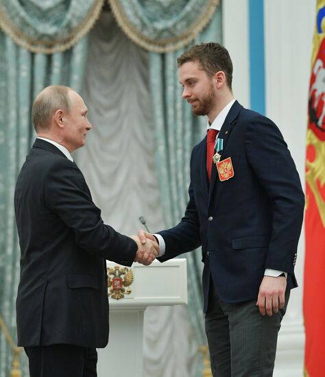 President Vladimir Putin presents state decorations to 2018 Winter Olympics medalists