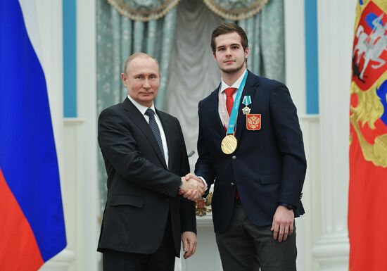 President Vladimir Putin presents state decorations to 2018 Winter Olympics medalists