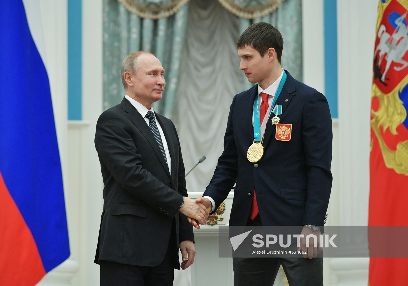 President Vladimir Putin presents state decorations to 2018 Winter Olympics medalists