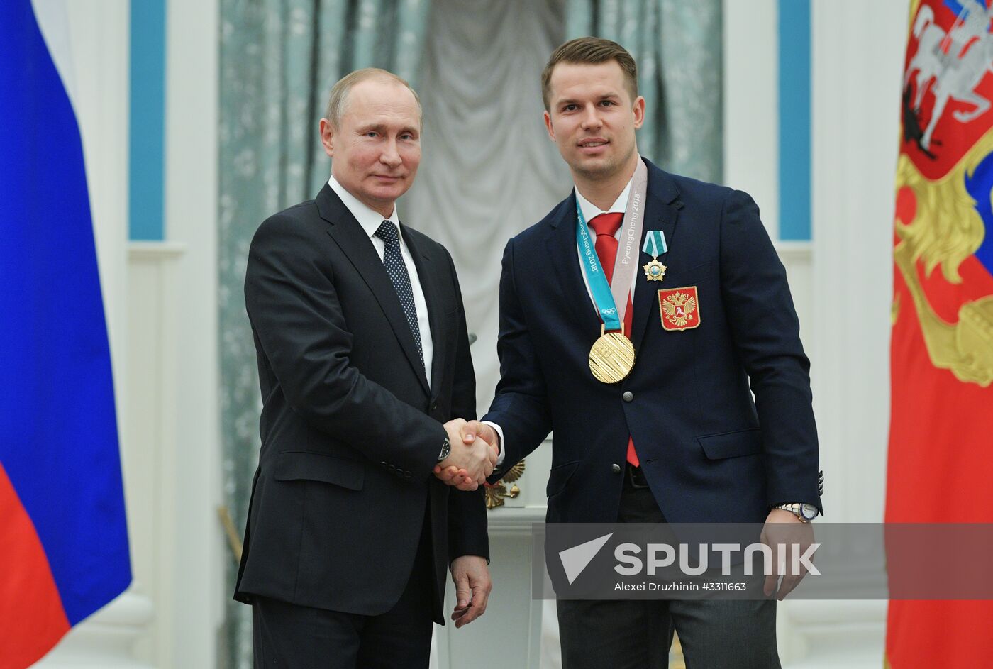 President Vladimir Putin presents state decorations to 2018 Winter Olympics medalists