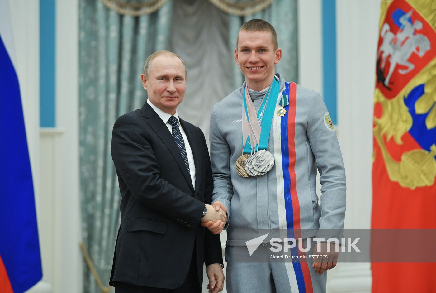 President Vladimir Putin presents state decorations to 2018 Winter Olympics medalists