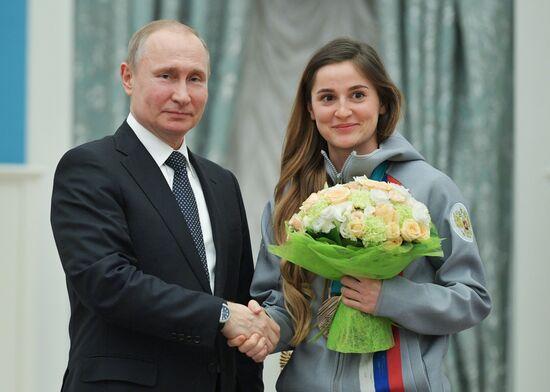 President Vladimir Putin presents state decorations to 2018 Winter Olympics medalists