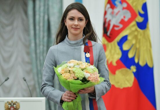 President Vladimir Putin presents state decorations to 2018 Winter Olympics medalists