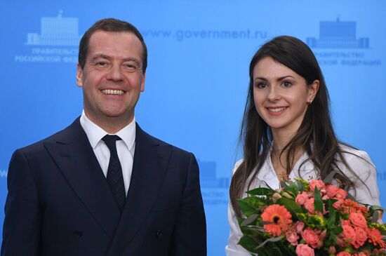 Prime Minister Dmitry Medvedev presents cars to 2018 Winter Olympics medalists at ceremony