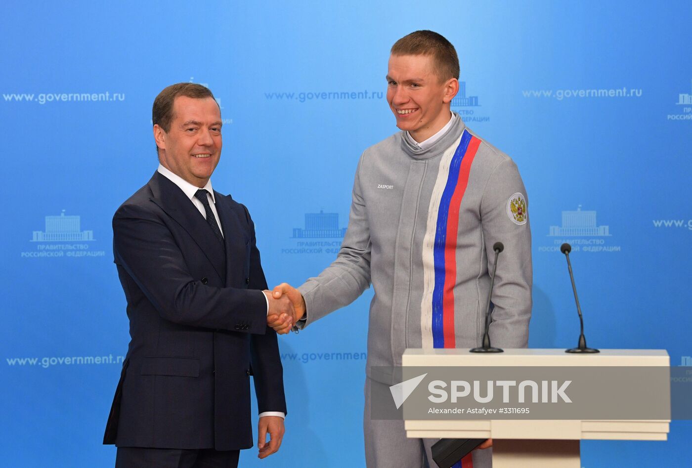 Prime Minister Dmitry Medvedev presents cars to 2018 Winter Olympics medalists at ceremony