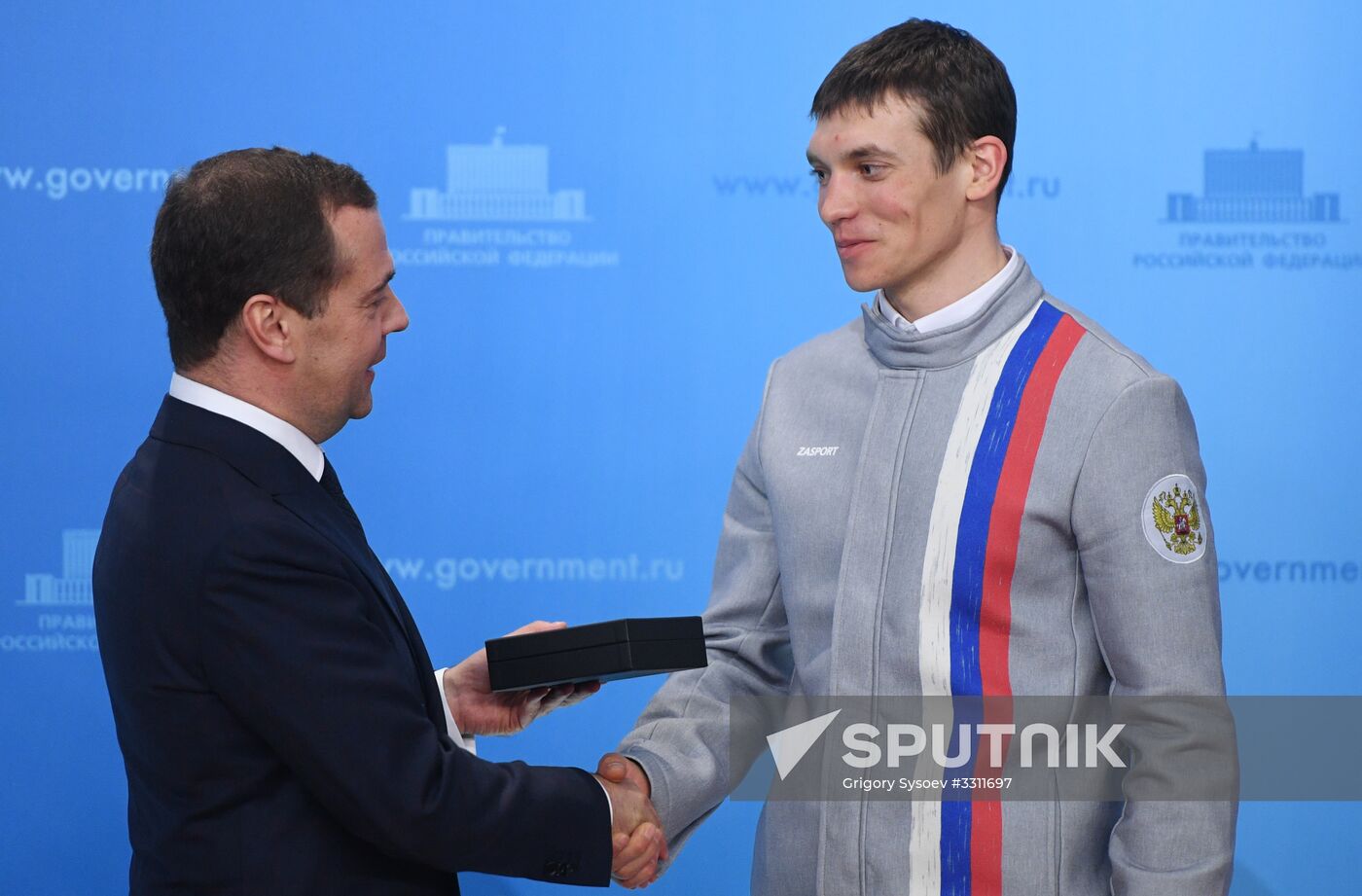 Prime Minister Dmitry Medvedev presents cars to 2018 Winter Olympics medalists at ceremony