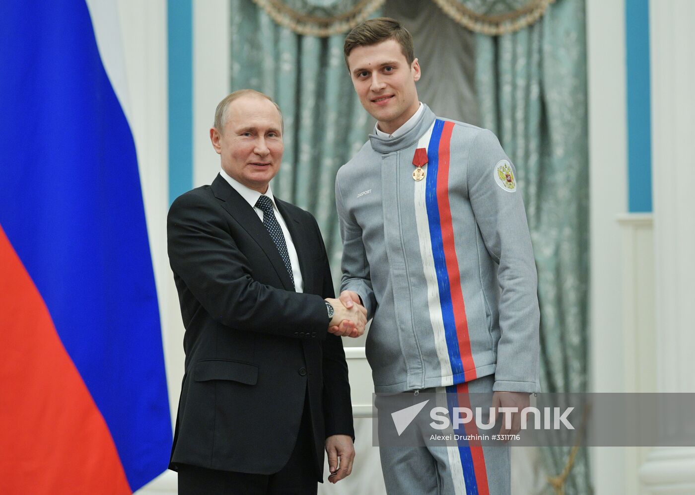President Vladimir Putin presents state decorations to 2018 Winter Olympics medalists