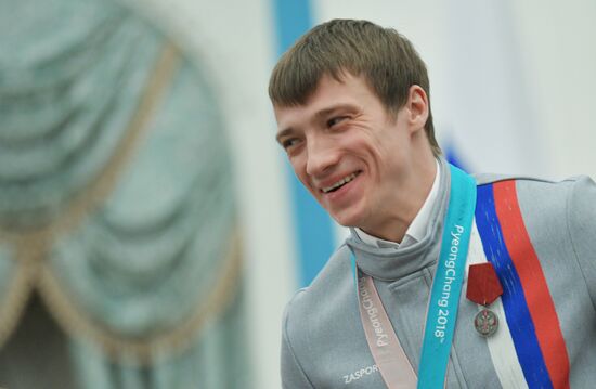 President Vladimir Putin presents state decorations to 2018 Winter Olympics medalists