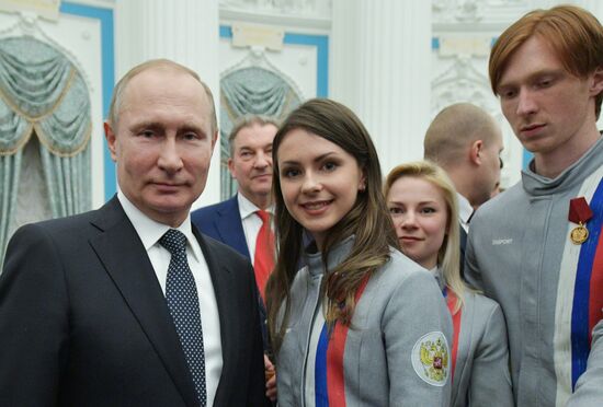 President Vladimir Putin presents state decorations to 2018 Winter Olympics medalists