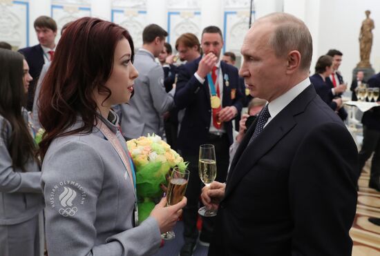 President Vladimir Putin presents state decorations to 2018 Winter Olympics medalists