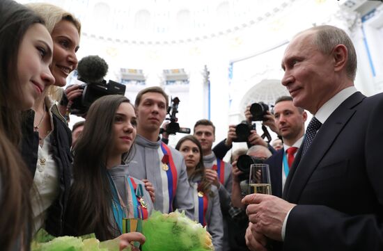 President Vladimir Putin presents state decorations to 2018 Winter Olympics medalists