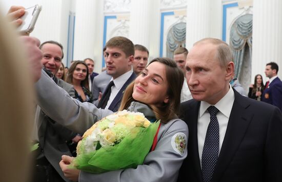 President Vladimir Putin presents state decorations to 2018 Winter Olympics medalists