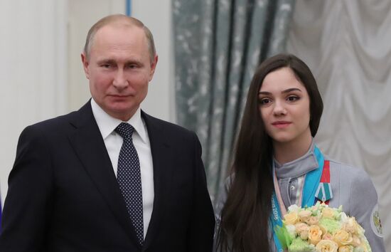 President Vladimir Putin presents state decorations to 2018 Winter Olympics medalists