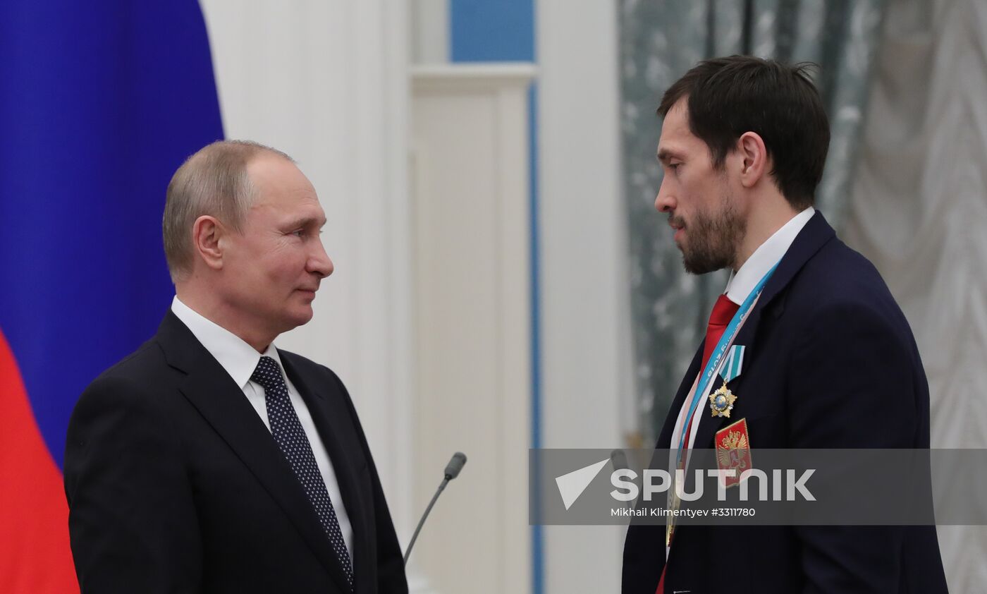 President Vladimir Putin presents state decorations to 2018 Winter Olympics medalists