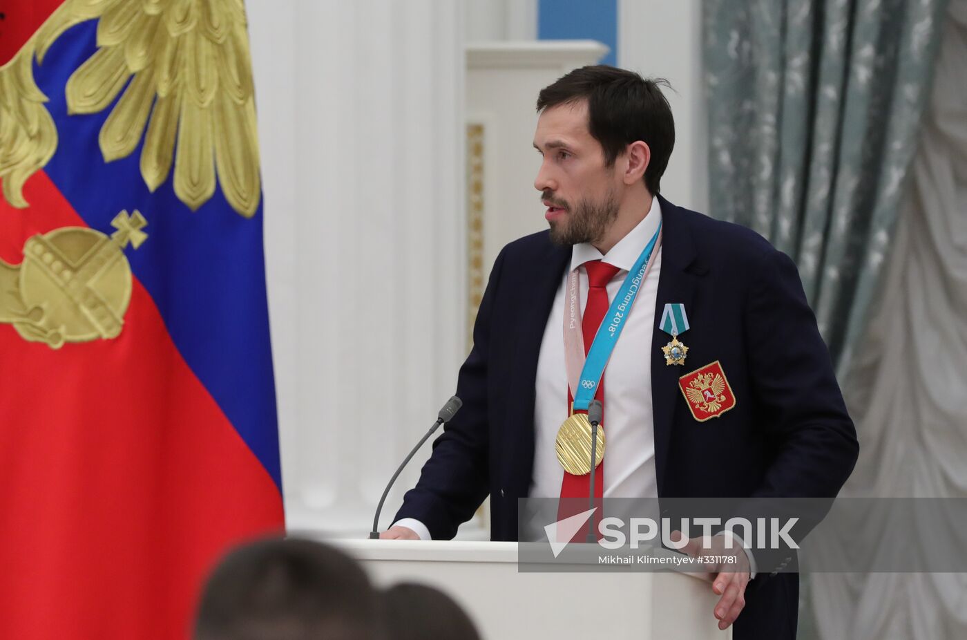 President Vladimir Putin presents state decorations to 2018 Winter Olympics medalists