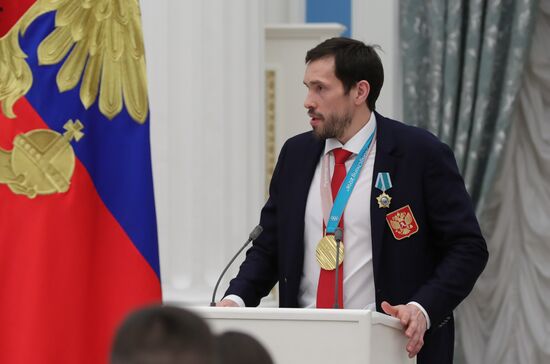 President Vladimir Putin presents state decorations to 2018 Winter Olympics medalists