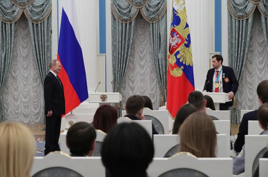 President Vladimir Putin presents state decorations to 2018 Winter Olympics medalists