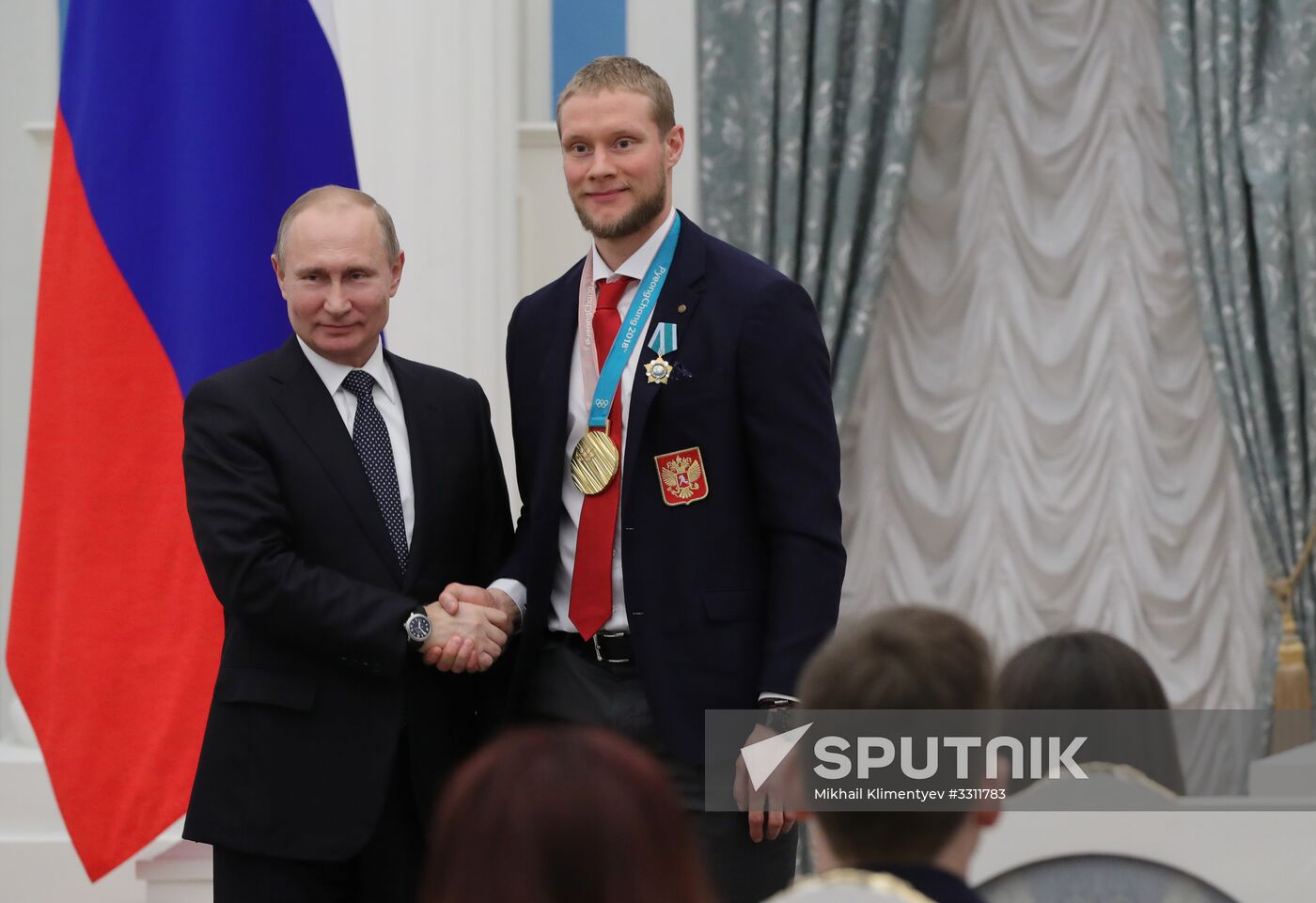 President Vladimir Putin presents state decorations to 2018 Winter Olympics medalists