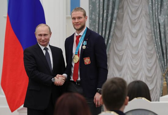 President Vladimir Putin presents state decorations to 2018 Winter Olympics medalists
